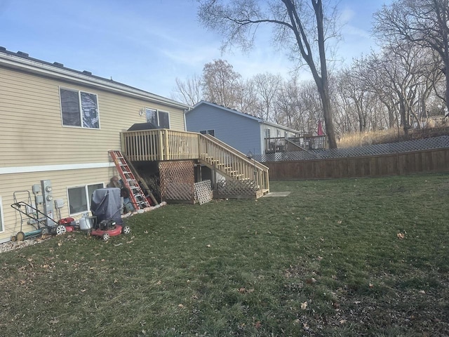 view of yard featuring a wooden deck