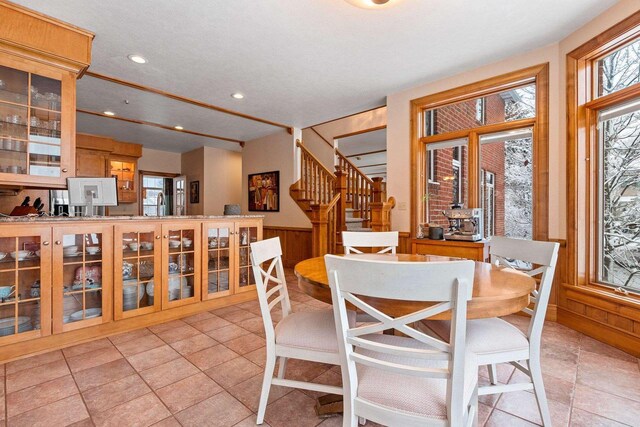 2532 Huntington Way, Suamico, WI 54173 - dining area with recessed lighting, stairway, a wainscoted wall, and wood walls