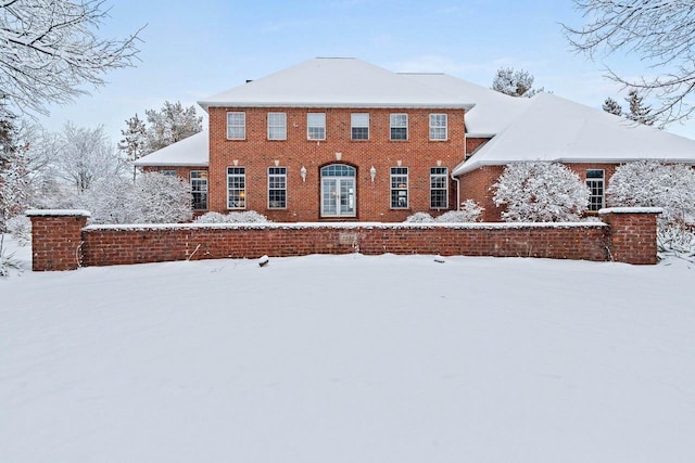 2532 Huntington Way, Suamico, WI 54173 - snow covered back of property featuring brick siding