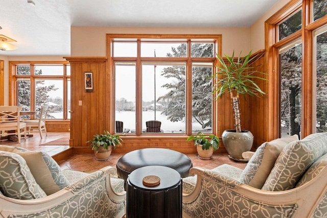 2532 Huntington Way, Suamico, WI 54173 - sitting room with a wealth of natural light, tile patterned flooring, and a water view