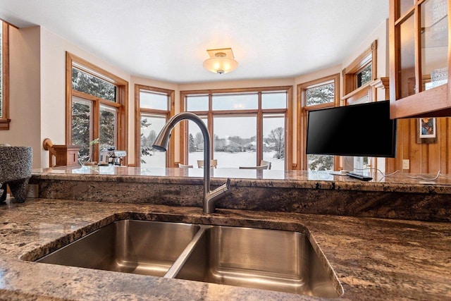 2532 Huntington Way, Suamico, WI 54173 - kitchen featuring dark stone counters and a sink
