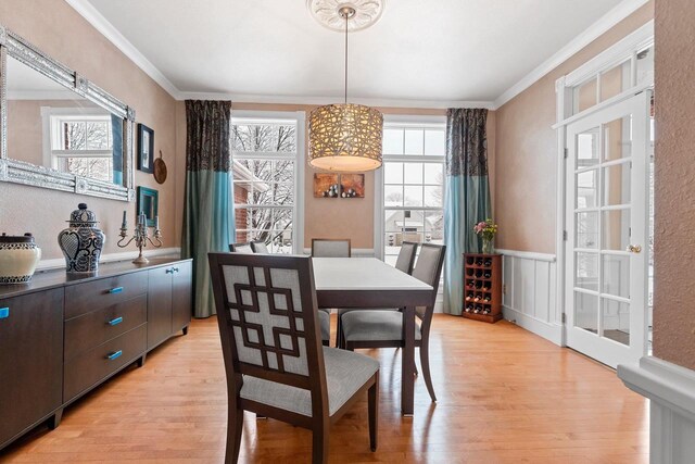 2532 Huntington Way, Suamico, WI 54173 - dining room with light wood-type flooring and ornamental molding