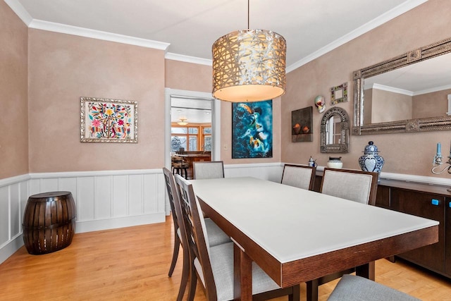 2532 Huntington Way, Suamico, WI 54173 - dining room featuring light wood finished floors, wainscoting, and ornamental molding