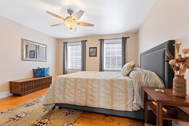 2532 Huntington Way, Suamico, WI 54173 - bedroom featuring ceiling fan, baseboards, and wood finished floors