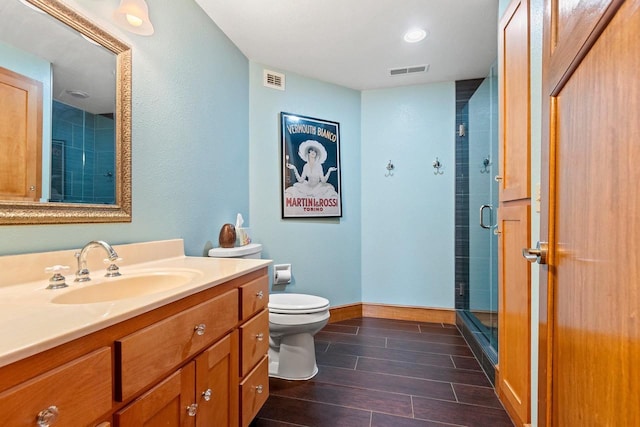 2532 Huntington Way, Suamico, WI 54173 - full bath with a shower stall, wood finished floors, visible vents, and vanity