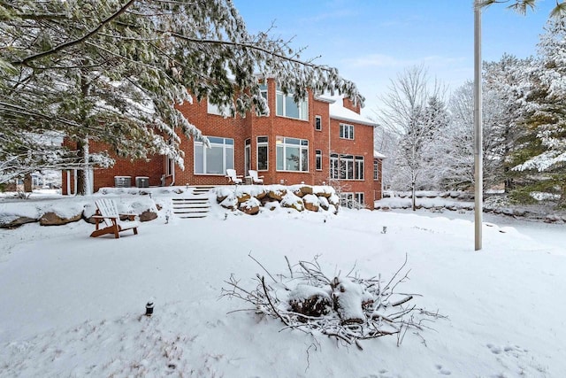 2532 Huntington Way, Suamico, WI 54173 - snow covered back of property with brick siding