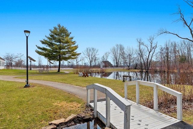 2532 Huntington Way, Suamico, WI 54173 - view of dock with a yard and a water view
