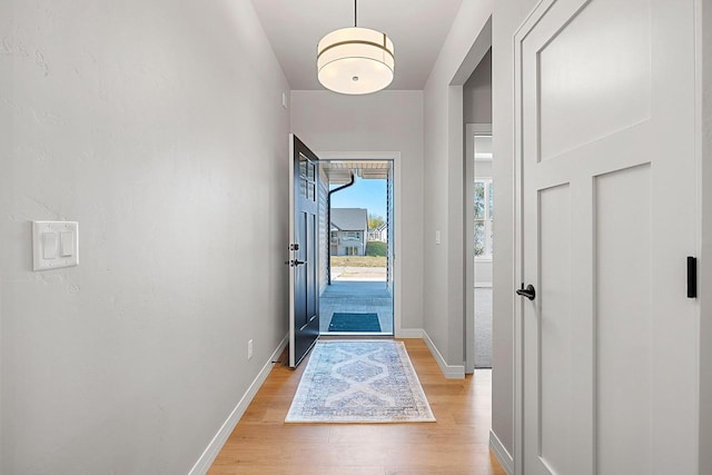 entryway with light hardwood / wood-style floors