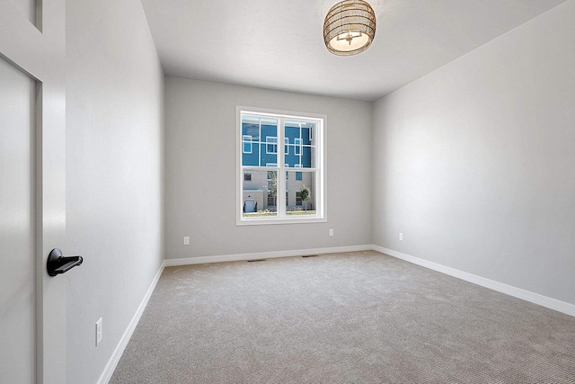 view of carpeted spare room