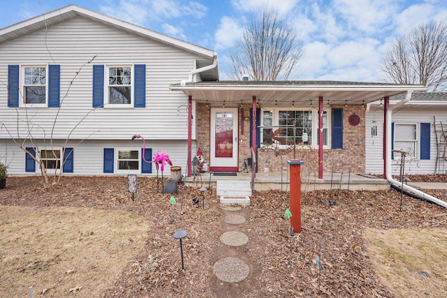 tri-level home with a porch