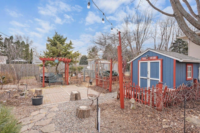 view of yard with a patio area and a shed