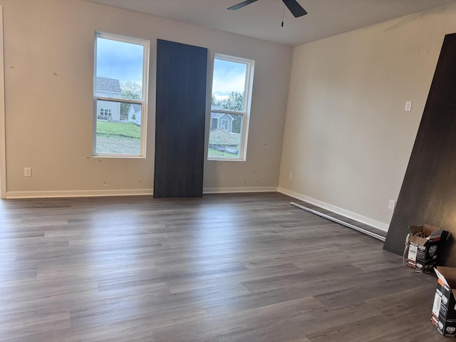 4414 20th St, Kenosha, WI 53144 - empty room with ceiling fan, dark wood finished floors, and baseboards