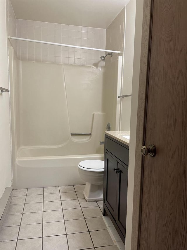 full bathroom featuring vanity, shower / bathing tub combination, tile patterned floors, and toilet