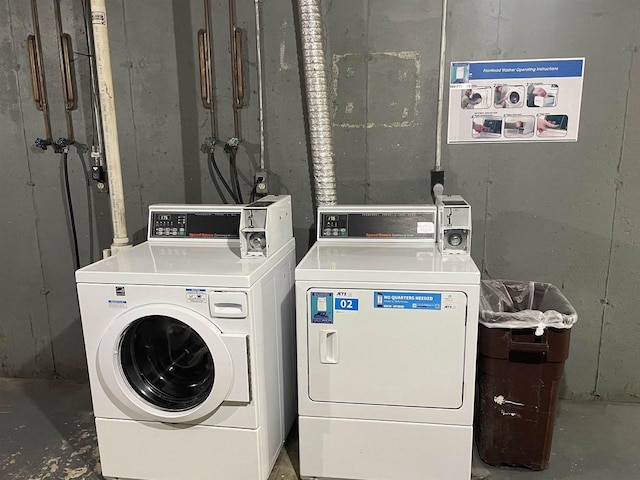 laundry room with washing machine and dryer