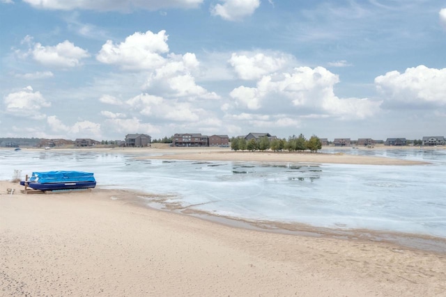 property view of water featuring a beach view