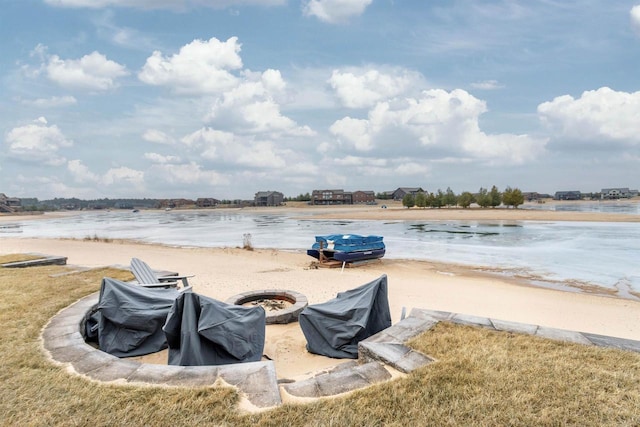 water view with an outdoor fire pit