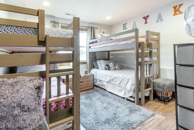 bedroom with light hardwood / wood-style flooring