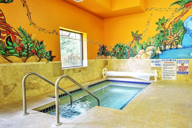 view of swimming pool featuring an indoor in ground hot tub