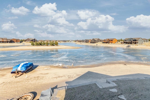 property view of water featuring a view of the beach