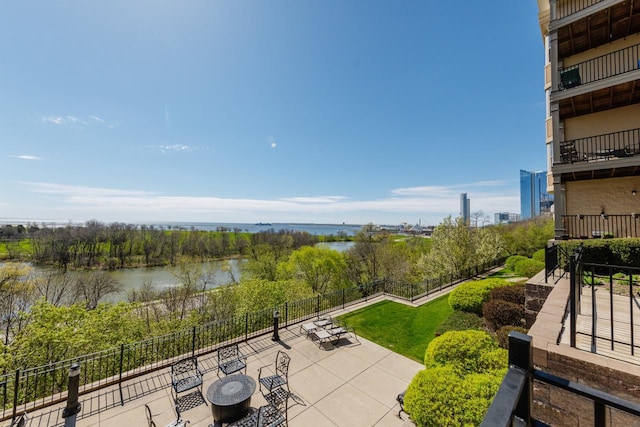 view of patio featuring a water view