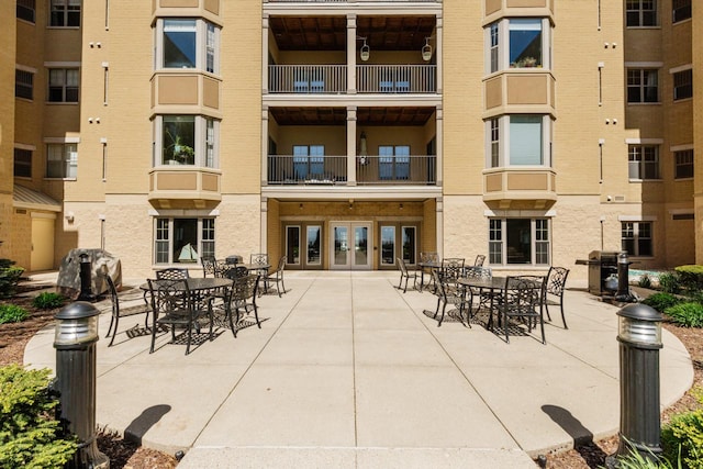 view of patio featuring a grill