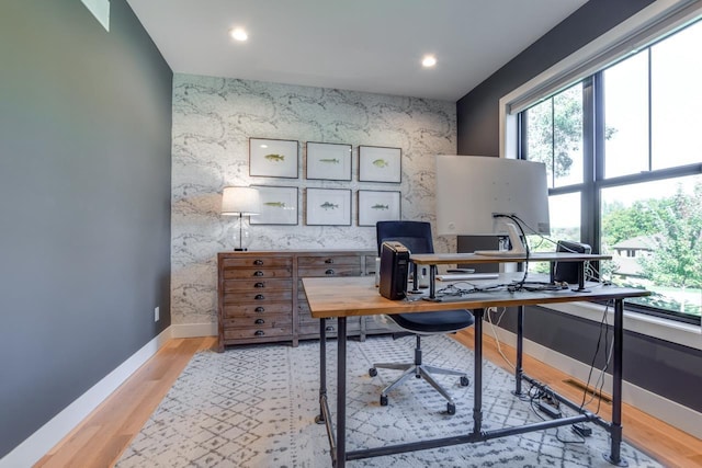 office area with light hardwood / wood-style flooring