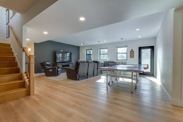 playroom featuring light wood-type flooring