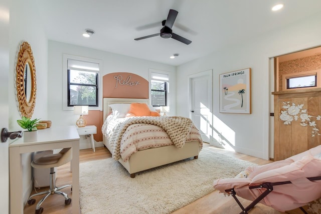 bedroom featuring ceiling fan and light wood-type flooring