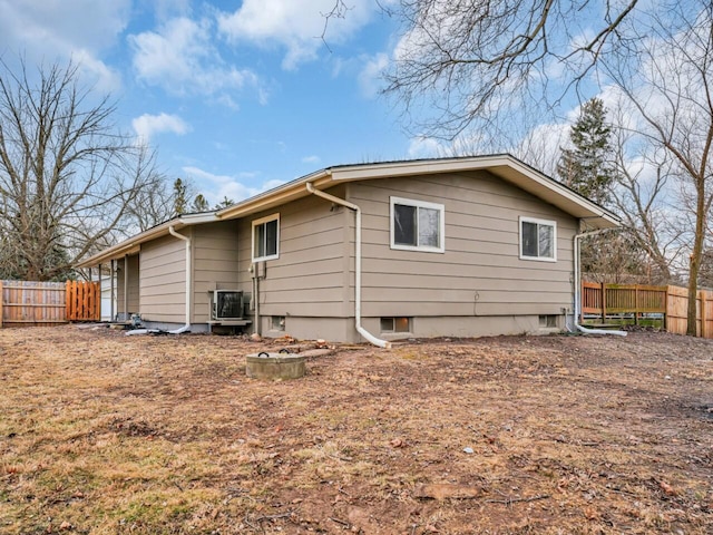 back of house with cooling unit