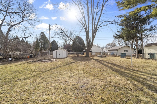 view of yard with a storage unit