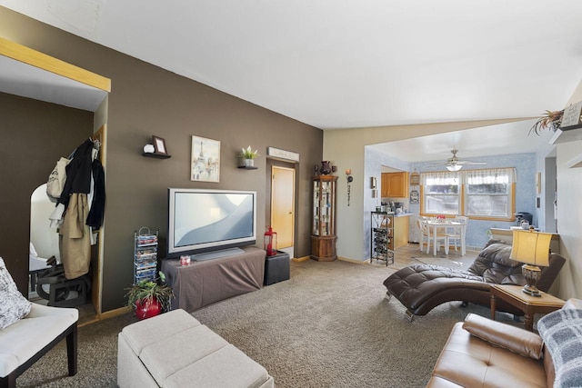 living room featuring carpet floors and ceiling fan