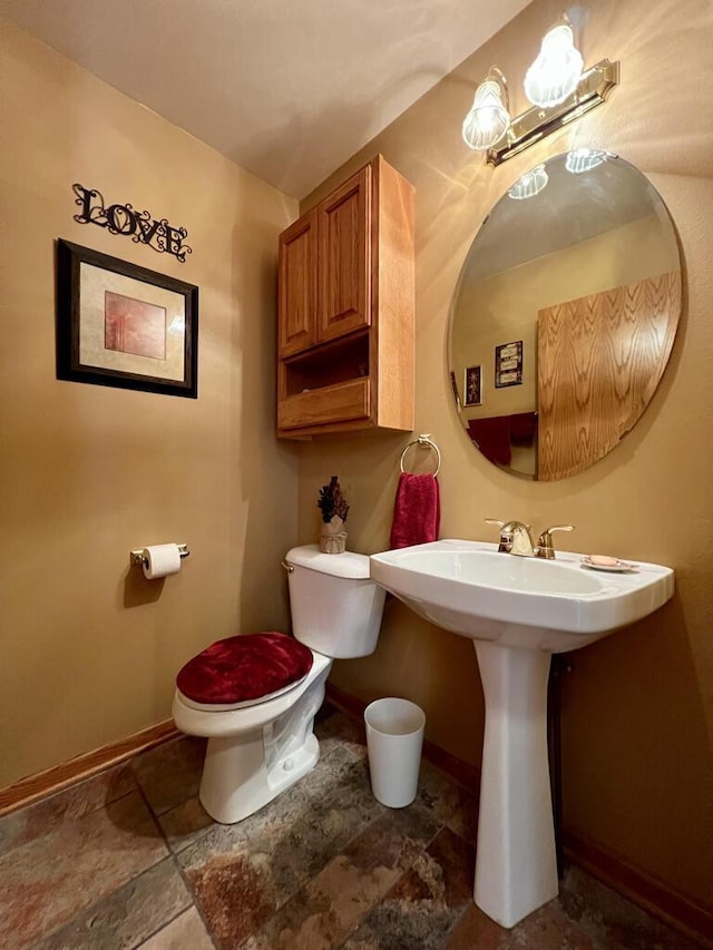 bathroom featuring toilet