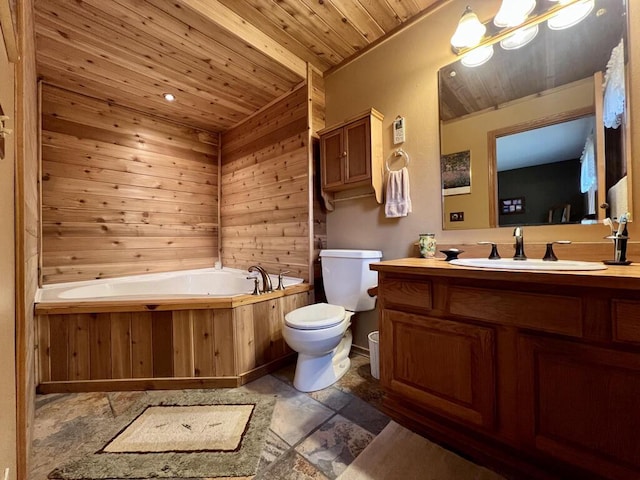 bathroom with wood ceiling, vanity, toilet, a bathing tub, and wood walls