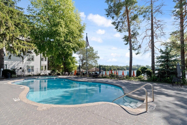 view of pool with a patio area