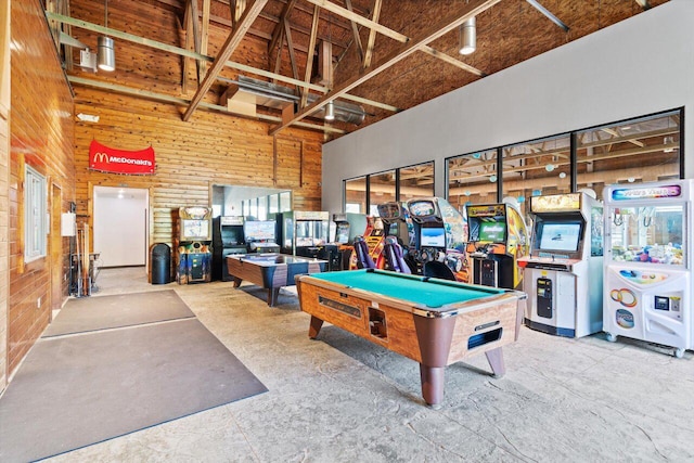 playroom featuring a towering ceiling and pool table