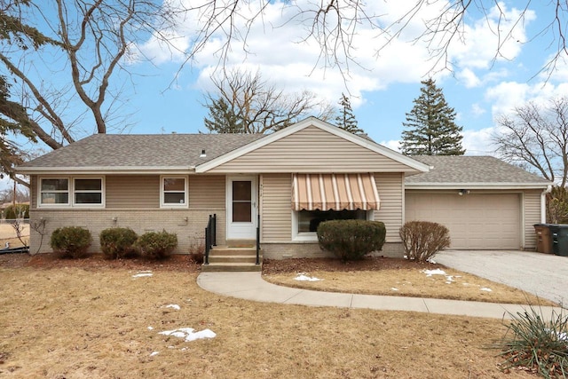 single story home with a garage