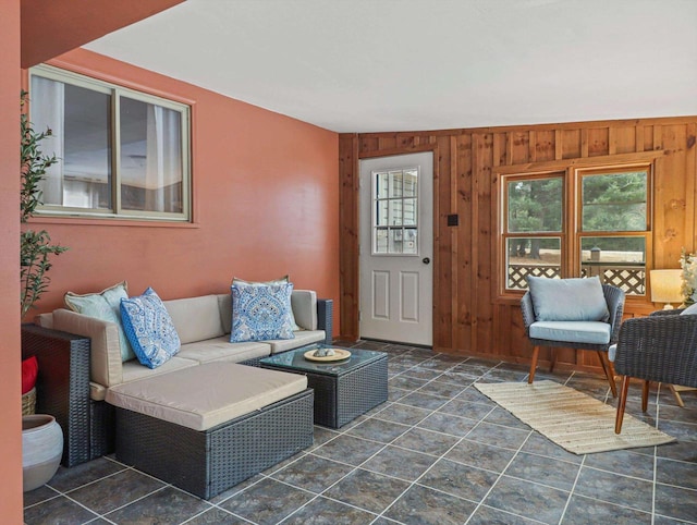 living room with wooden walls