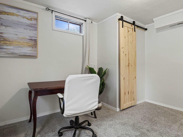 office space featuring a barn door and carpet