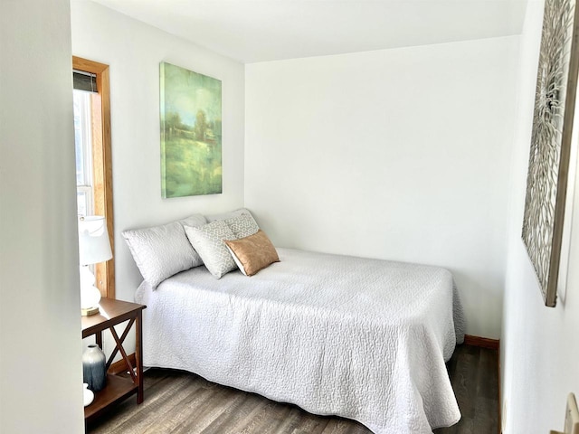 bedroom featuring wood-type flooring