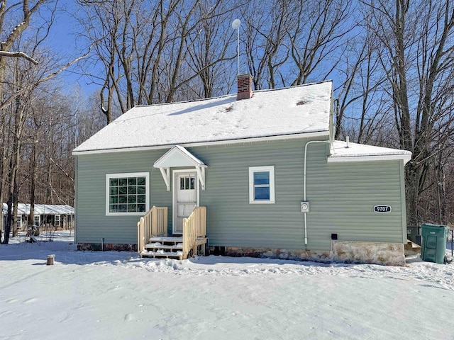 view of snow covered property