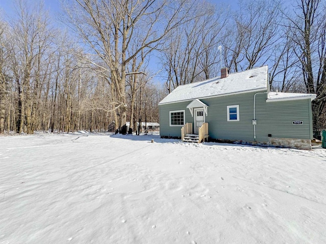 view of snow covered property