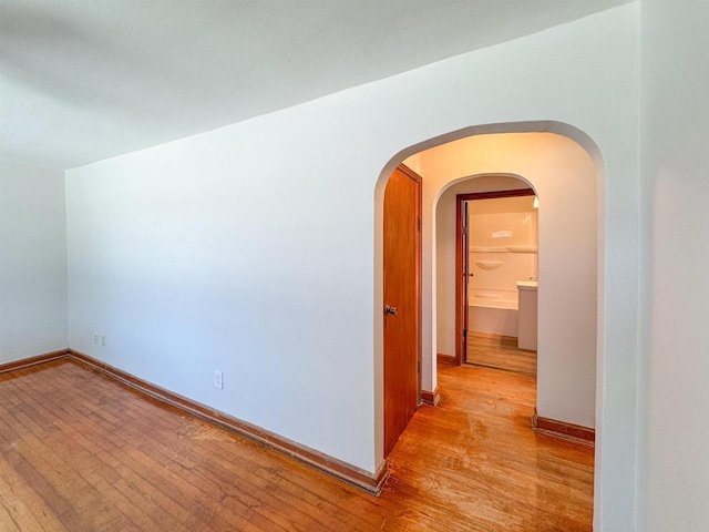 unfurnished room featuring light wood-type flooring