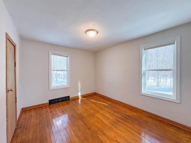 empty room featuring light hardwood / wood-style flooring