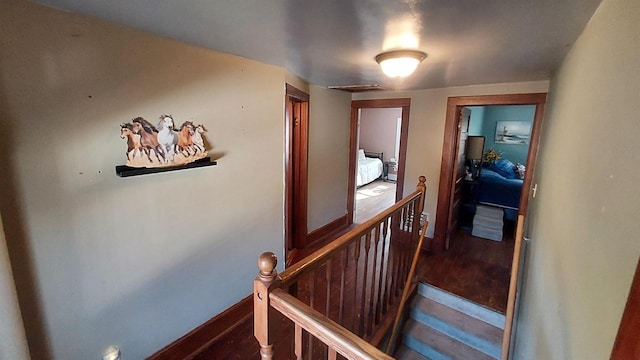 hallway featuring dark wood-type flooring