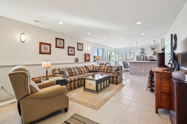 living room with light tile patterned floors