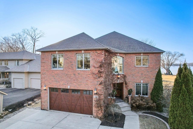 view of front of property with a garage