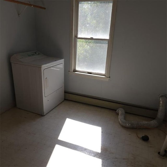 clothes washing area featuring washer / clothes dryer