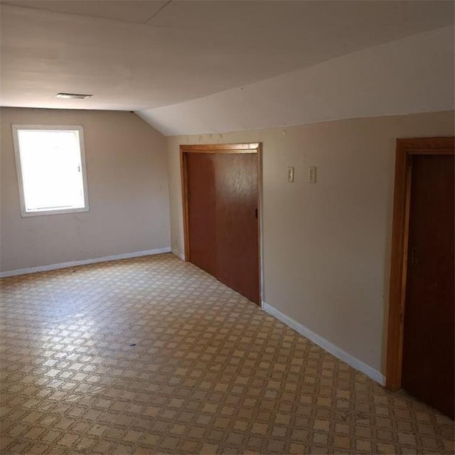 bonus room with lofted ceiling