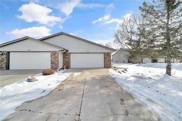 single story home with a garage