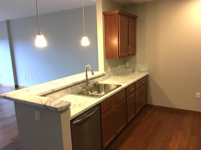 kitchen with pendant lighting, sink, dark wood-type flooring, dishwasher, and kitchen peninsula